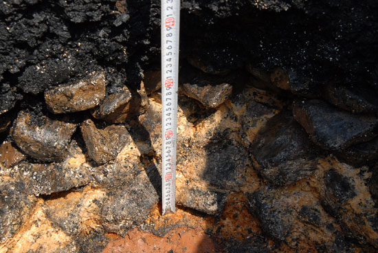 Layer of pebbles in the foundation part of central structure of the site of Koguryo Chomsongdae Observatory Layer of pebbles in the foundation part of central structure of the site of Koguryo Chomsongdae Observatory