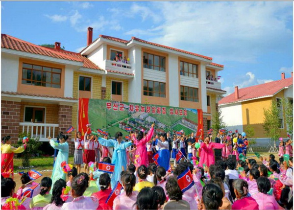 Agricultural workers are pleased after receiving dwelling houses