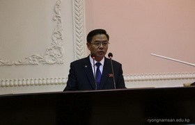 경애하는 김정은동지께서 김일성종합대학 교육자살림집을 현지지도하신 10돐 기념보고회 진행