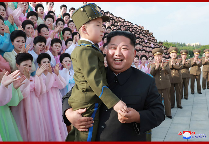 Supreme Leader Kim Jong Un Has Photo Session with Members of Art Groups of KPA Officers