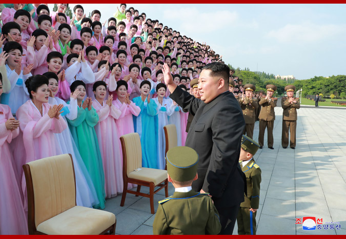 Supreme Leader Kim Jong Un Has Photo Session with Members of Art Groups of KPA Officers