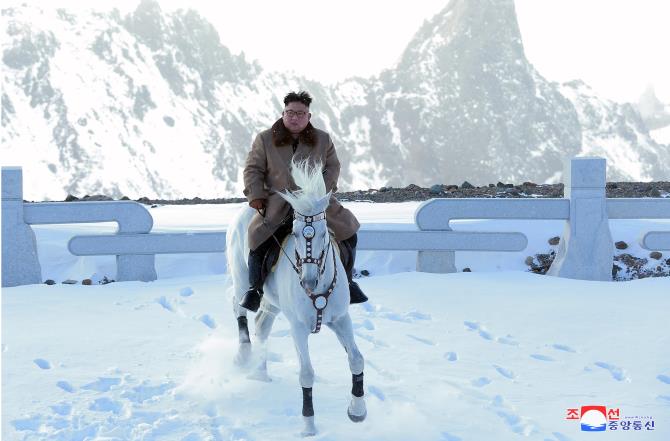 Supreme Leader Kim Jong Un Ascends Mt Paektu on Horseback