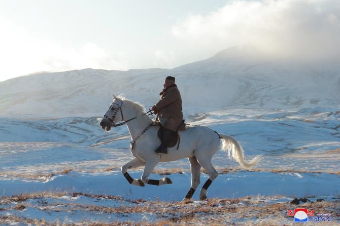Supreme Leader Kim Jong Un Ascends Mt Paektu on Horseback