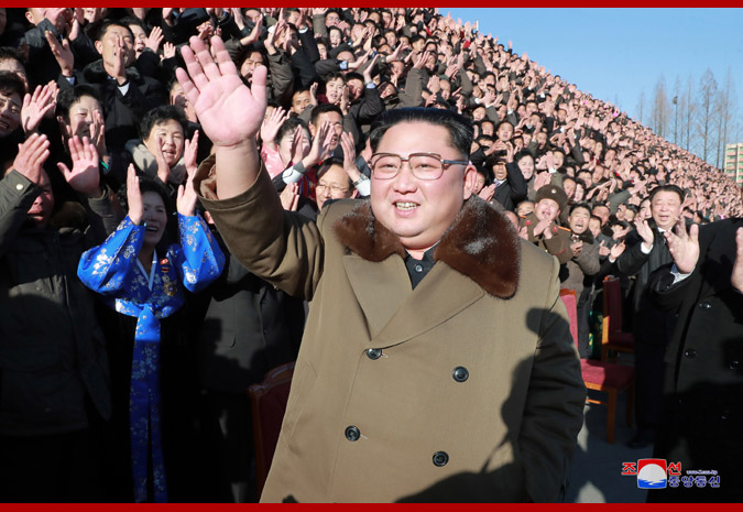 Supreme Leader Kim Jong Un Has Photo Session with Activists in Agricultural Field